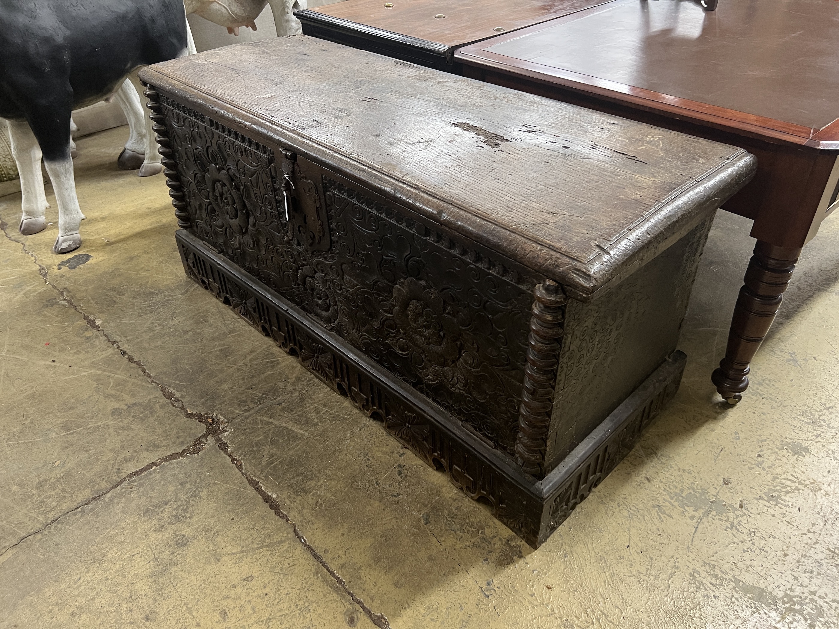 A large 17th century and later continental oak coffer (adapted), width 156cm, depth 58cm, height 72cm